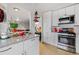 Updated kitchen with stainless steel appliances, granite countertops, and ample cabinet space at 800 N Washington St # 710, Denver, CO 80203