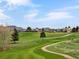 Scenic view of the golf course at 16631 Red Cliff Cir, Morrison, CO 80465