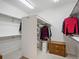Organized walk-in closet featuring shelving and drawers for optimal storage solutions at 16631 Red Cliff Cir, Morrison, CO 80465