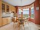 Cozy breakfast nook with large bay window and great natural light at 16631 Red Cliff Cir, Morrison, CO 80465