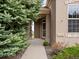 Close up of the front entrance to the home, showcasing the address and welcoming entryway at 16631 Red Cliff Cir, Morrison, CO 80465
