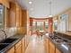 Spacious kitchen with lots of counter space, tile floors and view to dining area at 16631 Red Cliff Cir, Morrison, CO 80465