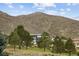 Beautiful backyard view with mountain backdrop at 11227 Explorers Run, Littleton, CO 80125