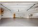 Spacious three car garage with epoxy flooring at 11227 Explorers Run, Littleton, CO 80125