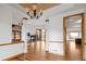 Spacious living room with hardwood floors, fireplace, and open floor plan at 11227 Explorers Run, Littleton, CO 80125