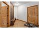 Mudroom with wood accents including a bench and wall mounted coat hooks at 11227 Explorers Run, Littleton, CO 80125
