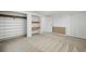 Large bedroom with shelving and closet space and clean carpet at 21863 E Oxford Pl, Aurora, CO 80018