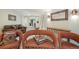 Spacious living room with comfortable seating, a mirror, and stylish decor at 21863 E Oxford Pl, Aurora, CO 80018