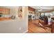 Inviting living room with hardwood floors, fireplace, and ample natural light at 21863 E Oxford Pl, Aurora, CO 80018