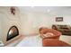 Comfortable living room with a fireplace and ample seating at 21863 E Oxford Pl, Aurora, CO 80018