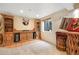 Entertainment area with built-in bar and comfortable seating at 21863 E Oxford Pl, Aurora, CO 80018