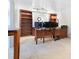 Bright office space with built-in bookshelves and an abundance of natural light at 21863 E Oxford Pl, Aurora, CO 80018