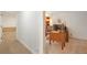 Bright office space with a large desk and a view of the hallway at 21863 E Oxford Pl, Aurora, CO 80018