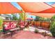 Relaxing patio area featuring shade sails and an outdoor lounge area at 21863 E Oxford Pl, Aurora, CO 80018