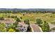 Aerial view of a home situated near a park, with a walking trail, and lush landscaping at 4678 Springmeadow Ln, Castle Rock, CO 80109