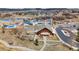 Beautiful community clubhouse with swimming pools, a waterslide, and other amenities at 4678 Springmeadow Ln, Castle Rock, CO 80109