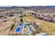 Neighborhood park featuring tennis courts, baseball fields, a playground, and green spaces at 4678 Springmeadow Ln, Castle Rock, CO 80109