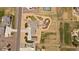 Aerial view of the home, landscaping, large lot, sports court, pergola, hot tub, and outdoor kitchen at 12590 Valentia St, Thornton, CO 80602