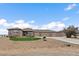 Charming home featuring a stone facade, three-car garage, and well-maintained landscaping at 12590 Valentia St, Thornton, CO 80602