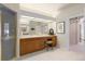 Bright bathroom featuring vanity area and glass shower at 60 Glenalla Pl, Castle Rock, CO 80108