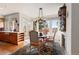 Cozy breakfast nook with fireplace and bright windows at 60 Glenalla Pl, Castle Rock, CO 80108