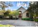 Charming home exterior featuring a beautiful stone pathway and meticulously landscaped front yard at 60 Glenalla Pl, Castle Rock, CO 80108