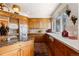 Kitchen with cabinets, breakfast bar, and plenty of counter space at 60 Glenalla Pl, Castle Rock, CO 80108