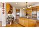 Kitchen with desk area and island at 60 Glenalla Pl, Castle Rock, CO 80108