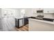 Bright kitchen with stainless appliances, dishwasher and gas range cooktop at 9265 Cathay Ct, Commerce City, CO 80022