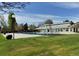 Community pool featuring a large pool and a diving board on a grassy lawn at 5766 S Fulton Way, Greenwood Village, CO 80111