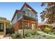 A stunning two-story exterior with a balcony, brick accents, and modern design at 814 S High St, Denver, CO 80209