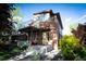 Modern two-story home boasting a brick facade and spacious balcony for outdoor enjoyment at 814 S High St, Denver, CO 80209