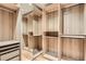 Spacious walk-in closet with custom built-in shelving and ample storage for organization and convenience at 814 S High St, Denver, CO 80209