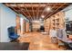 Unfinished basement with exposed ceiling and a large open area at 801 Hanover St, Aurora, CO 80010