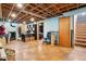 Unfinished basement with exposed ceiling and painted walls at 801 Hanover St, Aurora, CO 80010