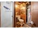 Small unfinished bathroom with exposed plumbing at 801 Hanover St, Aurora, CO 80010