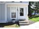 Inviting townhome with manicured lawn, bright windows and a charming entrance at 10515 W Dartmouth Ave, Lakewood, CO 80227