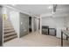 Finished basement with tile floors, a wine fridge, and bonus space at 1521 Pontiac St, Denver, CO 80220