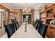 Elegant dining room with decorative chandelier, window, and wood accents at 1521 Pontiac St, Denver, CO 80220