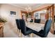 Warm and inviting dining room with wood floors and classic decor at 1521 Pontiac St, Denver, CO 80220