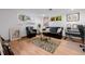 Cozy basement living room with eclectic decor and comfortable seating at 1521 Pontiac St, Denver, CO 80220