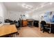 Bright studio space with track lighting, perfect for creative projects and hobbies at 1521 Pontiac St, Denver, CO 80220