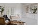 Bright bathroom with double doors, seating area, and a white vanity at 1312 Sandstone Ct, Boulder, CO 80305