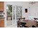 Light-filled dining area with deck access and modern finishes at 1312 Sandstone Ct, Boulder, CO 80305