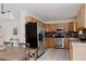 Bright kitchen with stainless steel appliances, granite countertops, and light wood cabinetry at 1312 Sandstone Ct, Boulder, CO 80305