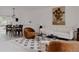 Open living space featuring a couch, chairs, and a dining table at 1312 Sandstone Ct, Boulder, CO 80305