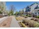 Serene community park with walking paths, playground, and well-maintained landscaping at 8156 E 35Th Ave, Denver, CO 80238