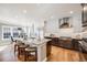 Modern kitchen featuring a large island, stainless steel appliances, and plenty of counter space at 8156 E 35Th Ave, Denver, CO 80238