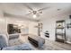 Inviting living room with an open floor plan, combining the living area and kitchen with wood-look flooring at 1612 Cottonwood Dr # 2W, Louisville, CO 80027