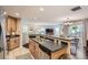 Modern kitchen with stainless steel appliances and an island at 12832 Mayfair Way # F, Englewood, CO 80112